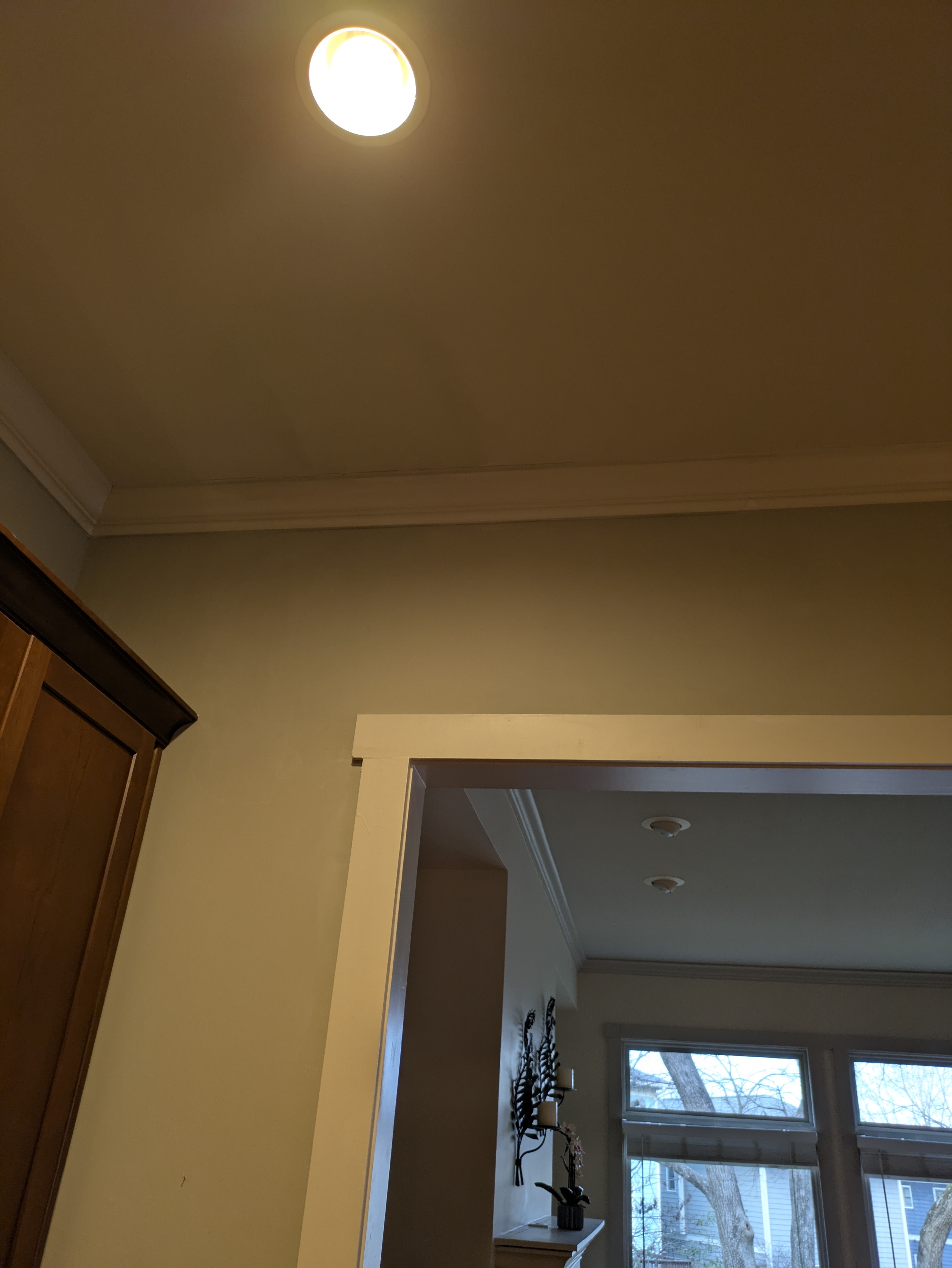 New recessed lighting installed in a bathroom ceiling